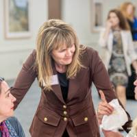 A group of women speaking